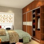 Wooden wardrobe in a small bedroom